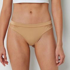 Your first layer should be the most comfortable, so we designed this Ambrielle thong panty from super-soft, stretch-knit that sits right at the waist, and features delicate lace side detail.Fiber Content: 79% Nylon, 21% SpandexFabric Description: MicrofiberCare: Machine Wash, Tumble DryCountry of Origin: Imported Beige Soft Touch Intimate Briefs, Soft Stretch Intimate Briefs, Soft Solid Color Intimate Briefs, Lace Side, High Cut, Lace Trim, Lingerie, Trim, The Originals