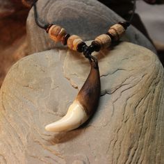 Large Rustic Wolf Tooth Necklace Wolf Teeth Necklace Wolf Necklace Wolf Tooth Necklace Adjustable African Native American Large Wolf Tooth Necklace Simple rustic large wolf tooth necklace made by me with wood & coco shell beads on an adjustable leather cord I purchase these teeth through a trader that goes around buying them and other things from Tibetan farmers that protect their livestock from the wolves Very nice and simple handmade wolf tooth adjustable necklace on a leather cord. Please vie Teeth Necklace, Large Wolf, Wolf Tooth Necklace, Largest Wolf, Collarbone Necklace, Wolf Tooth, Wolf Teeth, Wolf Necklace, Tooth Necklace