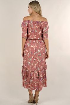 Embrace boho chic with our flowy maxi dress, crafted in a dreamy pink floral print. Featuring a comfortable elastic neckline for off-the-shoulder styling, complemented by a ruffle tiered hem that enhances its free-spirited silhouette. The tassel tie detail adds that perfect bohemian touch, making it an ideal choice for any Spring/Summer wardrobe. FINAL SALE Floral Print Maxi length Elastic neckline Off shoulder Keyhole front with tie detail Tiered Hi/Low Ruffle trim Elastic waistline Adjustable waist tie with tassel detail Women's spring maxi dress Model is 5'9, wearing a size S.Style: I-71937W-QZS-TC Terracotta Blush, Flowy Bohemian Dresses, Bohemian Dresses, Spring Maxi Dress, Flowy Maxi Dress, Pink Floral Print, Floral Print Maxi, Free Spirited, Bohemian Dress