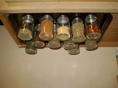 an organized spice rack with spices and seasonings