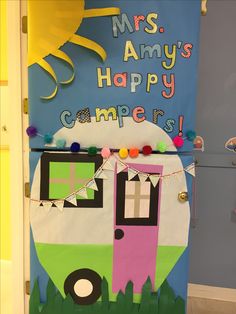 a door decorated to look like a camper with the words mrs ann's happy campers on it