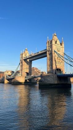 the tower bridge is very high above the water