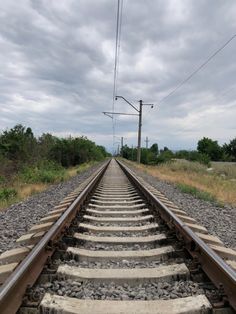 an old railroad track stretching into the distance