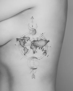 a black and white photo of a woman's stomach with a world map on it