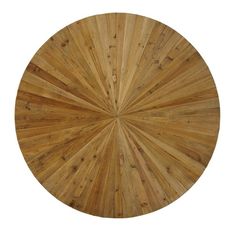 a round wooden table with an intricate design