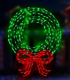 LED wreath wire decoration. Pre-lit with green and red lights. Green Christmas Lights, Outdoor Christmas Wreaths, Wreath With Bow, Christmas Wreaths With Lights, Lighted Wreaths, Outside Christmas Decorations, Led Rope Lights, Door Wreaths Diy, Green Garland