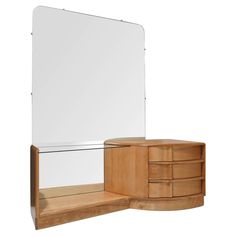 a wooden dresser with a mirror on top of it and drawers below the mirror, against a white background