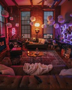 a living room filled with furniture and lights