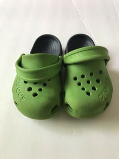 These are Crocs green and grey childrens size 7 slip on shoes. These sandals are clog style beach shoes. These are use in good shape. These will be shipped as a first class package. Thanks for looking. Check out our other auctions. All auctions paid for after 12pm Eastern Standard time shall be Shipped the next business day. No returns are accepted on used items. If a return is granted return shipping costs are the responsibility of the buyer. No refund will be issued until items for refund have Crocs Green, Clog Style, Clogs Style, Beach Shoes, On Shoes, Slip On Shoes, Green And Grey, Clogs, The Next