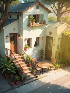 a house with potted plants on the front and stairs leading up to it's second story