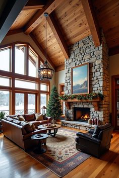 a living room filled with furniture and a fire place in front of a large window