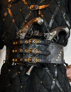 A belt, perfect for cosplay. Viking or pirate style. Buckles are hand forged from brass. Belt has 2 metal rings to hang additional equipment. Pistols are not included.  Size: Standard Length:  From 87,5 cm  (34,45 inches) to 97,5 cm (38,39 inches) - can be customized Width: - narrowest: 10,1 cm (3,98 inches) - widest: 13,3 cm (5,24 inches) Skin thickness: 3 mm (0,12 inches) - 4 mm (0.15 inches)  I can customize the size of the belt. If you want to, please select the "CUSTOM SIZE" option and writ Fantasy Belt Design, Pirate Belts, Fantasy Belt, Pirate Belt, Pirate Aesthetic, Pirate Fashion, Fantasy Style, Larp Costume, Pirate Woman