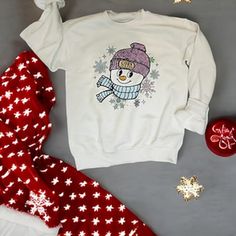 ** All apparel can be made on a different color shirt. Just send me a message and we can make a custom order ** This cozy season snowman surrounded by snowflakes is the CUTEST This is available in the following options in  WHITE: -Short sleeve tee -Long sleeve tee -Fleece lined crewneck -Fleece lined hoodie Gildan G640 SoftStyle Short Sleeve T-Shirt-these are BUTTER soft!     4.5 oz., 100% preshrunk ring spun cotton     Heather colors & Blackberry: 65% polyester, 35% ring spun cotton     Made wi Black Tears, Cozy Season, Lined Hoodie, Color Shirt, White Short, The Cutest, Sweat Shirt, Favorite Outfit, Short Sleeve Tee