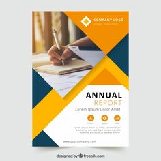 a yellow and blue annual report brochure with a pen on top of it