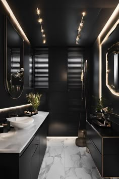 a modern bathroom with black walls and marble counter tops, along with large mirrors on the wall