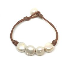 Elegant Round Adjustable Leather Bracelet, Handmade Adjustable Luxury Pearl Bracelet, Handmade Elegant Leather Bracelet, Elegant Handmade Leather Bracelet, Elegant Leather Beaded Bracelets With Adjustable Fit, Elegant Round Leather Jewelry, Adjustable Luxury Pearl Bracelet, Elegant Leather Beaded Bracelets As Gift, Luxury Adjustable Round Pearl Bracelet