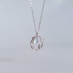 This beautiful necklace features a charming bunny nestled within a wreath. To add a touch of sparkle and magic, this necklace also includes a shimmering aurora stone. The stone is carefully selected to complement the design, and adds a beautiful glow that catches the eye. Material: 925 Sterling Silver, Aurora Stone, Cubic Zirconia Length: Total length 44cm (40cm + 4cm extension chain) Pendant size: 1.5cm x 1.9cm ●We ensure your item is beautifully packaged in Dreamm premium drawer gift box. ●We Rabbit Minimalist, Necklace Cute, Cute Rabbit, Silver Gifts, Beautiful Necklace, Chain Pendant, Chain Pendants, In The Garden, Beautiful Necklaces