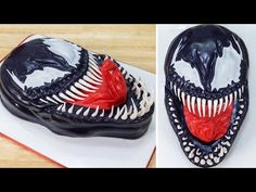 an alien head cake is decorated with black and white icing, while the inside looks like it has red teeth