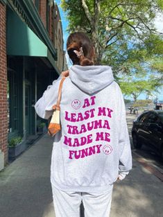 Embrace Awareness: At Least My Trauma Made Me Funny Sweatshirt - Laughs & Strength in a Y2K Throwback Calling all emotional powerhouses with a touch of Y2K flair! This comfy "At Least My Trauma Made Me Funny" sweatshirt from Embrace Awareness lets you celebrate your journey, spark conversations, and rock a trendy vibe - all while reminding everyone that mental health matters. Do you wear your heart on your sleeve and use humor to navigate life? We get you! This sweatshirt is the perfect way to n Funny Preppy, Preppy Hoodie, Y2k Inspired Outfit, Funny Mental Health, Vsco Hoodie, Y2k Vibes, Y2k Hoodie, The Embrace, Y2k Clothing