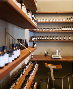 a room filled with lots of bottles and shelves