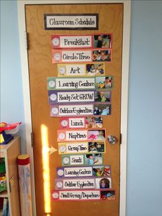 a door decorated with pictures and magnets for children's art class on it