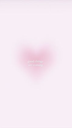 there is a pink heart with the words good things are coming in white on it