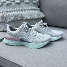 Never Worn, Nike React Sneaker, Light Gray/Whitish With Pink And Mint Accents (Women’s), Size: 9.5. Selling Because I Have Had Them For Over A Year And Never Wore Them. Comment Any Questions Or Make An Offer!! Nike Court Vintage, Nike Joyride, Pink And Mint, White High Tops, Juicy Couture Charms, Nike Metcon, Swim Shoes, High Shoes, Nike React