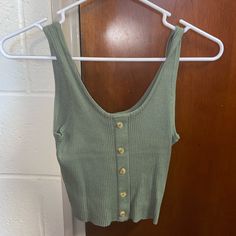 This Tank Top Is Brand New With The Tag Still Attached. It’s Never Been Worn Or Washed Before. The Material Is Very Soft And Stretchy- Size Small Fitted Green Tank Crop Top, Fitted Cotton Tank Top By H&m, Green Cotton H&m Tops, H&m Fitted Cami Tank Top, Green Tank Crop Top With Built-in Bra, Button Tank Top, Green Button, H&m, Tank Top