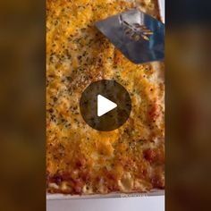 a pizza sitting on top of a pan covered in cheese