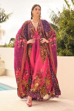 Purple and pink long printed kaftan in chiffon base highlighted with hand applied crystals. Paired with a long viscose silk cape. - Aza Fashions Purple Cape, Kaftan Pattern, Cape For Women, Silk Cape, Purple Princess, Pink Cape, Long Cape, Long Kaftan, Capes For Women