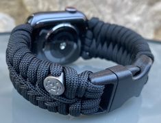 "FREE USPS PRIORITY MAIL SHIPPING FOR DOMESTIC US ORDERS (Includes U.S. Military APO/FPO Address Overseas) Thank you for visiting our shop \"Cording 2U\". A veteran owned business. Handcrafted Paracord wearables customized \"According To You\". Handcrafted with 100% Nylon Paracord \"MADE IN USA\" Our Products include: 🔹Custom handcrafted watch bands according to your wrist size, style, and color of choice. If you don't see it in our page yet, please contact us and we can discuss your options. ? Durable Adjustable Apple Watch Band For Outdoor, Outdoor Apple Watch Band, Adjustable Black Watch Bands With Custom Hardware, Adjustable Black Apple Watch Band For Outdoor, Customizable Watch Bands, Black Paracord Bracelet Strap Watch Band, Custom Black Watch Bands For Outdoor, Custom Black Outdoor Watch Bands, Adjustable Black Watch Band For Outdoor