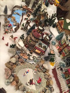 a christmas village with lots of toys and trees