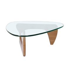 an oval glass table with wooden legs