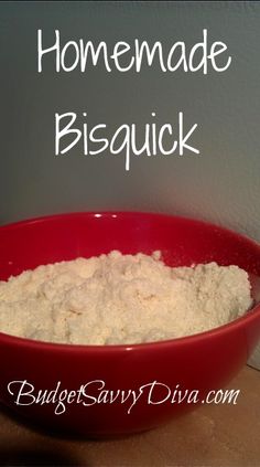 a red bowl filled with flour on top of a counter