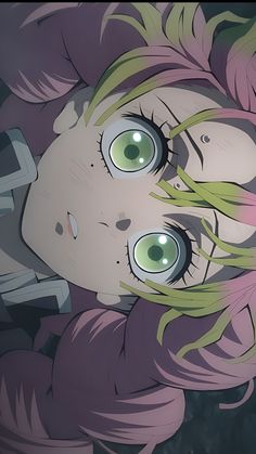 an anime character with green eyes and pink hair looking up at the camera from behind