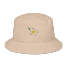 "Introducing our stylish and playful \"Get Pickled\" Pickleball Bucket Hat! Featuring high-quality embroidery and a wide brim for sun protection, this lightweight hat is perfect for pickleball enthusiasts who want to show off their love for the game while staying cool and comfortable on and off the court.  Our \"Get Pickled\" Bucket Hat is a must-have accessory that adds a touch of humor to your pickleball wardrobe!" Sports Cotton Bucket Hat, Summer Sports Cotton Bucket Hat, Cotton Sports Bucket Hat, Summer Sports Bucket Hat In Cotton, Summer Cotton Bucket Hat For Sports, Casual Summer Hats For Pickleball, Summer Outdoor Bucket Hat With Embroidered Logo, Pickle Ball, Visor Hat