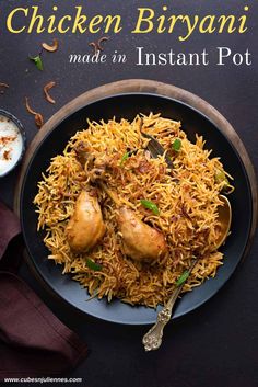 chicken biriyani served on a black plate