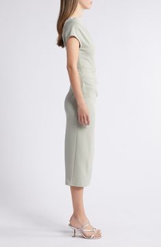 Whether you're off to the office or your next cocktail party, this stretch-enhanced sheath dress has you covered. Back zip closure Boat neck Short sleeves Unlined 90% polyester, 10% spandex Dry clean Made in the USA Spring Bodycon Dress With Asymmetrical Neckline For Work, Workwear Ruched Sheath Bodycon Dress, Spring Workwear Bodycon Dress With Asymmetrical Neckline, Ruched Sheath Bodycon Dress For Work, Sheath Bodycon Dress With Ruched Detail For Work, Knee-length Ruched Bodycon Dress For Work, Elegant Ruched Knee-length Bodycon Dress For Work, Men Home Decor, Hairstyling Products