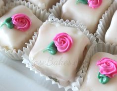 some white chocolates with pink roses on them