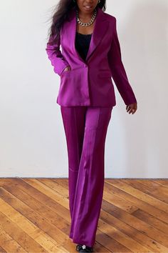 Stand apart in this classy pantsuits for women. Designed for the classy and feminine woman, this elegant purple pantsuit suits offer a perfect blend of sophistication and style. Whether you're attending a classy wedding or looking for an evening out, this pantsuits is tailored to perfection, ensuring you make a memorable impression. Dive into our collection of classy wedding guest outfits and shop for the perfect pantsuit that will make you stand out in any crowd Tailored Satin Blazer For Semi-formal Occasions, Long Sleeve Satin Business Suit, Satin Business Suit, Semi-formal Satin Tuxedo Blazer, Formal Satin Tuxedo-style Outerwear, Tailored Satin Outerwear For Formal Occasions, Business Satin Single Breasted Blazer, Satin Single Breasted Business Blazer, Tailored Satin Tuxedo Outerwear