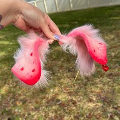 Valentines Day Puppy Ears Headband and large curled husky tail!

Pink floppy puppy ears with pink / red airbrush shading. Added red heart spots onto ears with heart “love” charm hanging from ear. PLEASE NOTE! THE LOVE CHARM WILL BE DIFFERENT THAN THE PHOTO, MY SUPPLIER FOR THE HEARTS IN THE PHOTO SOLD OUT, THE NEW HEART CHARM WILL BE SIMILAR!
Tail is 23 inches long with a belt loop! Tail comes with waist tie ribbon. Cute Lovecore, Puppy Ears And Tail, Puppy Ears Headband, Husky Tail, Ears And Tail Set, Puppy Ears, Ears And Tail, Tie Ribbon, Pink Puppy