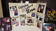 a table topped with pictures and frames covered in paper mache letters that spell out the word celebrating 50 years of love