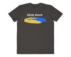 a t - shirt with the words sandy beach on it