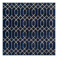 a blue rug with gold geometric design on the front and back of it's surface