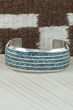 "This turquoise inlay and sterling silver bracelet was made by Navajo silversmith Larry Loretto. The inside of the bracelet is signed Loretto and stamped sterling. Size: 5 3/4\" (will fit up to a 7 1/8\" wrist) Gap: 1 3/8\" Width: 1 1/8\" Free shipping on all orders! We ship with USPS and always include tracking. All orders ship within a day of payment. Returns are accepted up to 30 days after you receive your order. Just send us a message. Our shop offers cash back or store credit. The item mus Luxury Sterling Silver Inlay Bracelet As Gift, Sterling Silver Bracelet, Native American Jewelry, Turquoise Sterling Silver, Free Jewelry, Sterling Silver Bracelets, Beautiful Earrings, Sterling Silver Earrings, Cuff Bracelets