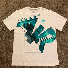 Nwot Mens Nike Tee Urban White Shirt With Graphic Print, Urban Style White Shirt With Graphic Print, White Urban Shirt With Graphic Print, Urban White Shirt With Logo Print, Sporty White Shirt With Graphic Design, Nike Tee, Nike Tees, Nike White, Nike Shirts