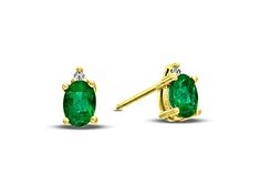 These stunning emerald and diamond earrings are available in 14k Gold. The diamonds have a total carat weight of 0.02 carats. Formal Yellow Gold Diamond And Emerald Earrings, Emerald Yellow Gold Diamond Earrings Fine Jewelry, Fine Jewelry Oval Emerald Earrings, Emerald Yellow Gold Diamond Earrings, Green Oval Diamond Earrings, Classic Green Diamond Earrings With Accents, Yellow Gold Emerald Diamond Earrings, Oval Emerald Earrings In Yellow Gold, Yellow Gold Diamond Earrings With Emerald