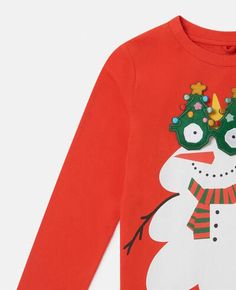 Christmas Long Sleeve Tops With Cartoon Print, Red Cartoon Print Tops For Winter, Long Sleeve Cartoon Print T-shirt For Winter, Playful Winter Cotton Tops, Playful Cotton Winter Tops, Playful Cotton Tops For Winter, Playful Long Sleeve Holiday Tops, Fun Winter Crew Neck T-shirt, Fun Crew Neck T-shirt For Winter