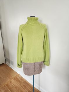 This vintage sweater is a colorful addition to any wardrobe. Jeanne Pierre Circa 1990s- 2000s 100% cotton Made in Hong Kong The turtleneck sweater is a vibrant shade of green. Tag size: large Shoulder to hem length: 19.25 inches Sleeve length: 21.5 inches Chest: 36 inches This sweater is in great vintage condition. Feel free to send me any questions! Green Turtleneck Sweater, Green Turtleneck, Winter Shirts, Pullover Sweater Women, Vintage Sweaters, Women Pullover, Turtleneck Sweater, Knitwear Women, Pullover Sweaters