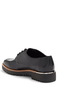 With modern materials, this lightweight lug sole derby is an easy way to polish up any casual fit. 1 1/2" heel, 1/2" platform Round apron toe Lace-up closure Synthetic upper, lining and sole Imported Modern Oxfords With Textured Sole For Work, Synthetic Oxfords With Textured Sole For Work, Patent Leather Oxfords With Contrast Sole For Work, Casual Oxfords With Lug Sole For Work, Casual Medium Width Oxfords For Work, Platform Plain Toe Oxfords For Work, Platform Oxfords Plain Toe For Workwear, Plain Toe Platform Oxfords For Work, Platform Oxfords For Work With Plain Toe